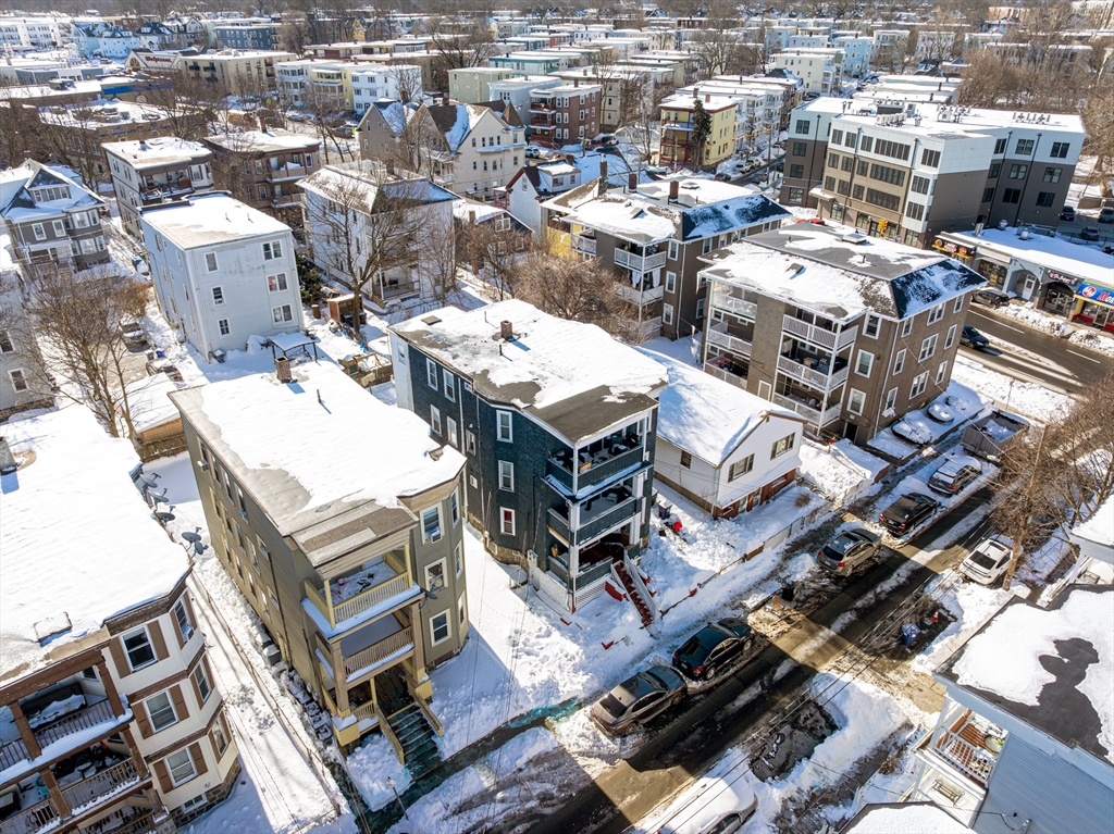 46 Theodore Street Boston, MA 02124 - Photo 24 of 24 an aerial view of a city with lots of residential buildings