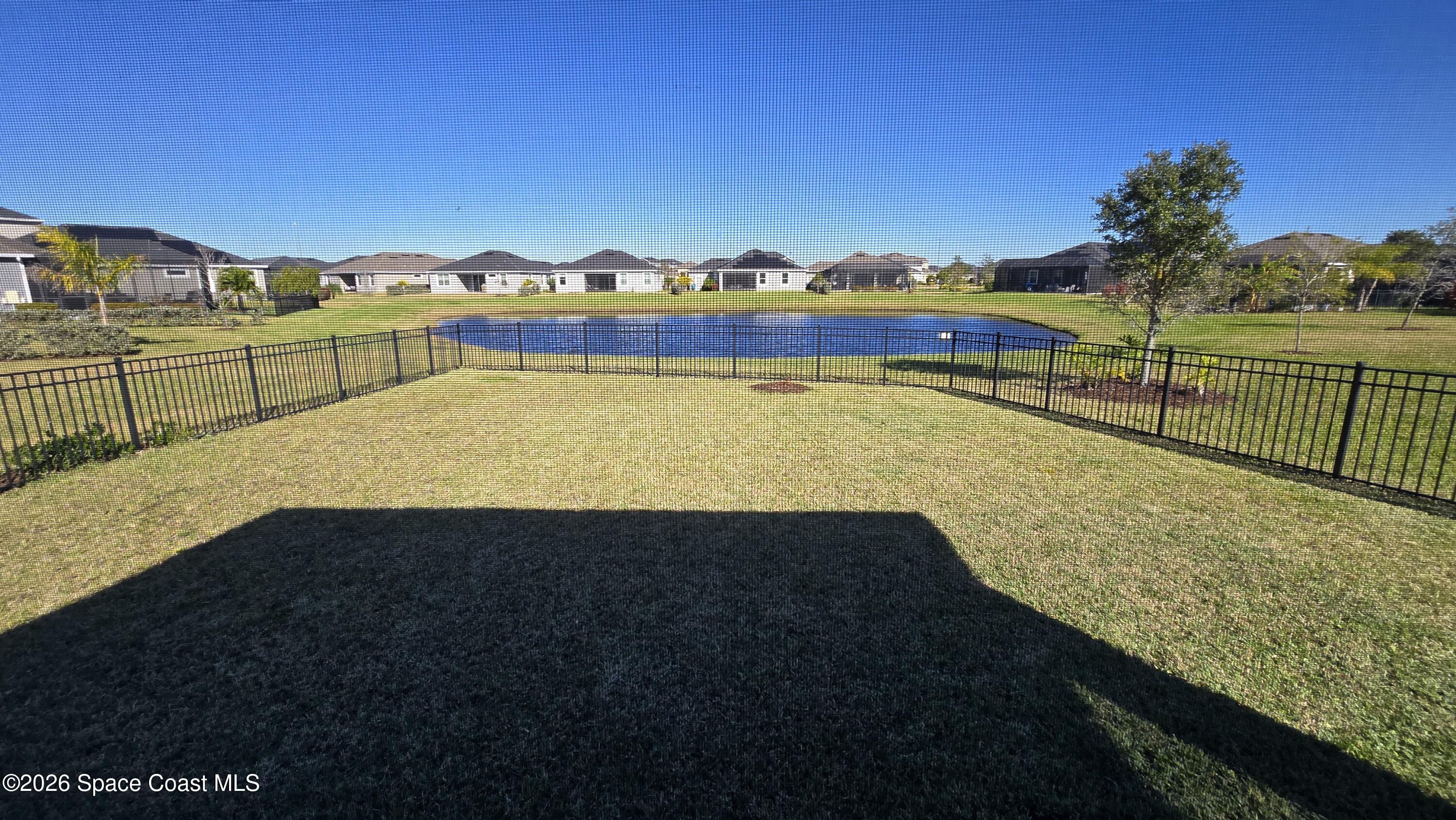 8137 Dobre Way Melbourne, FL 32940 - Photo 18 of 25 a view of an outdoor space and swimming pool