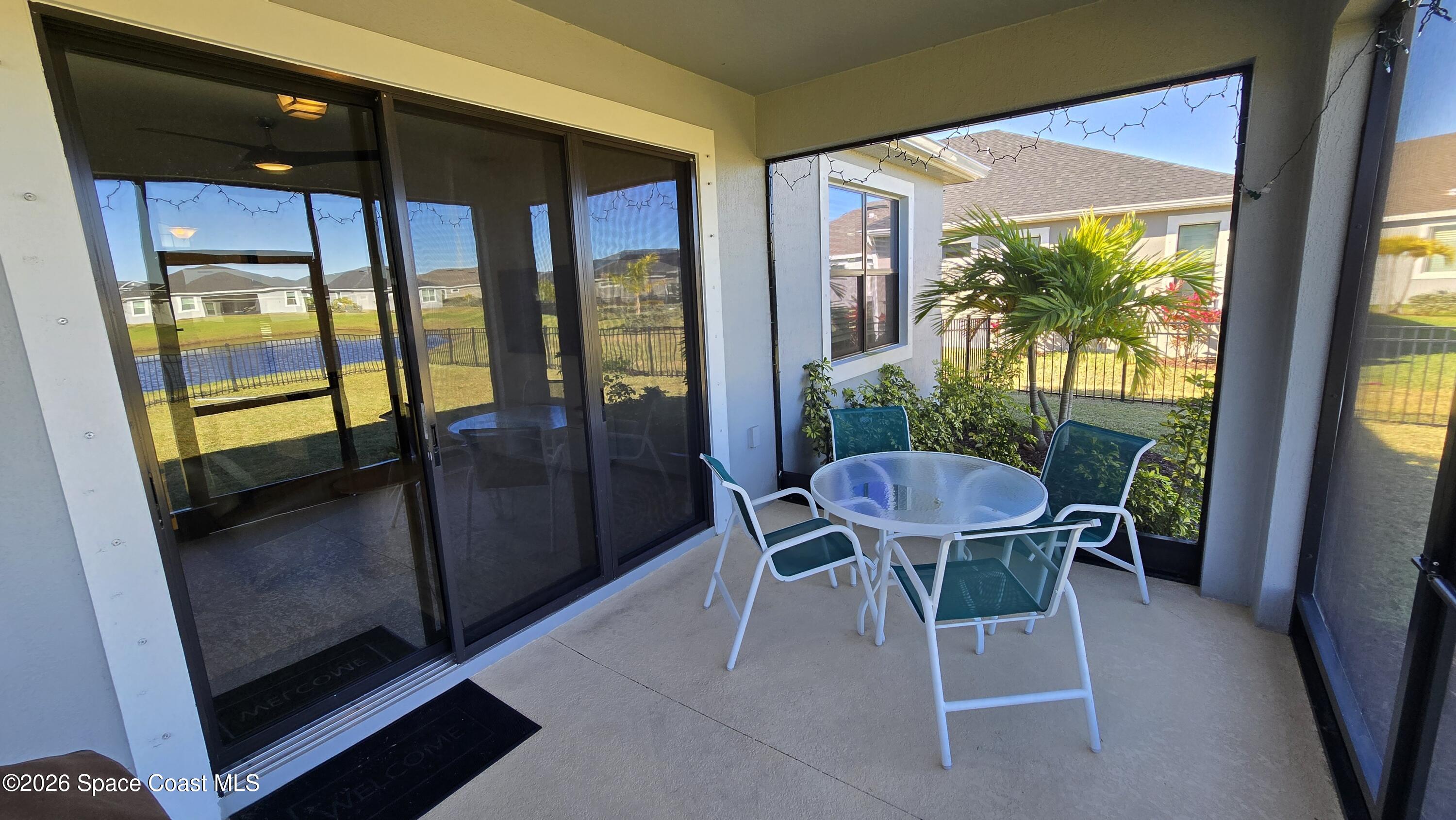 8137 Dobre Way Melbourne, FL 32940 - Photo 19 of 25 a view of a dining room with furniture window and outside view