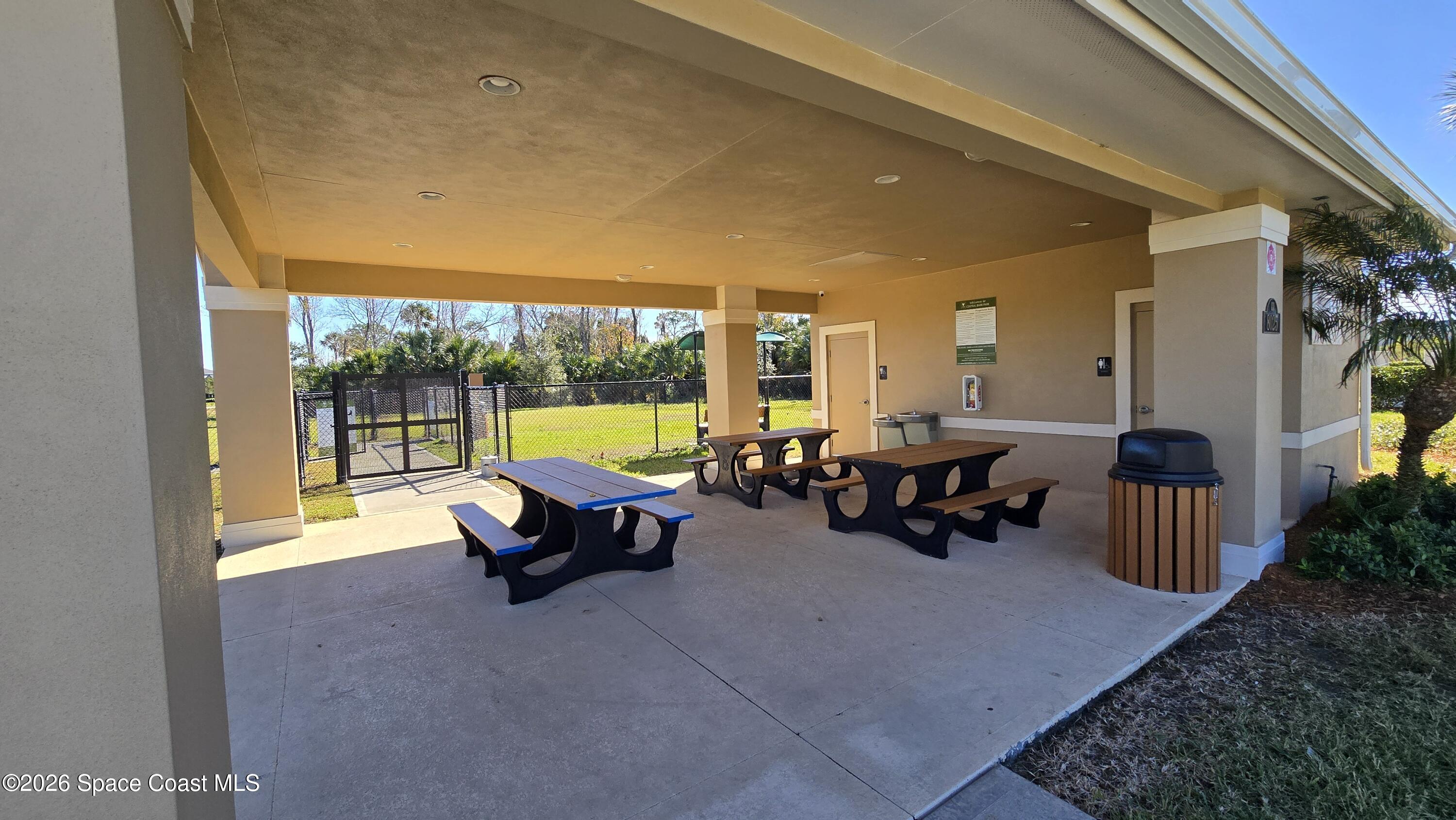 8137 Dobre Way Melbourne, FL 32940 - Photo 23 of 25 a living room with furniture and a large window