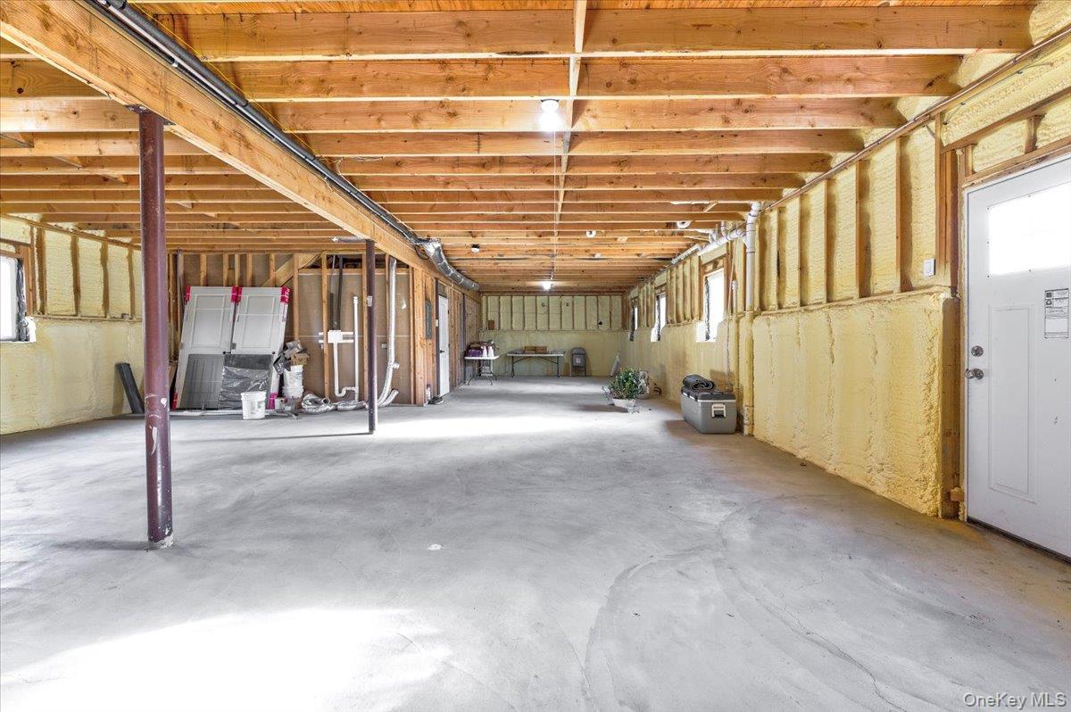 468 Granny Road Medford, NY 11763 - Photo 29 of 42 a view of a hall with wooden floor