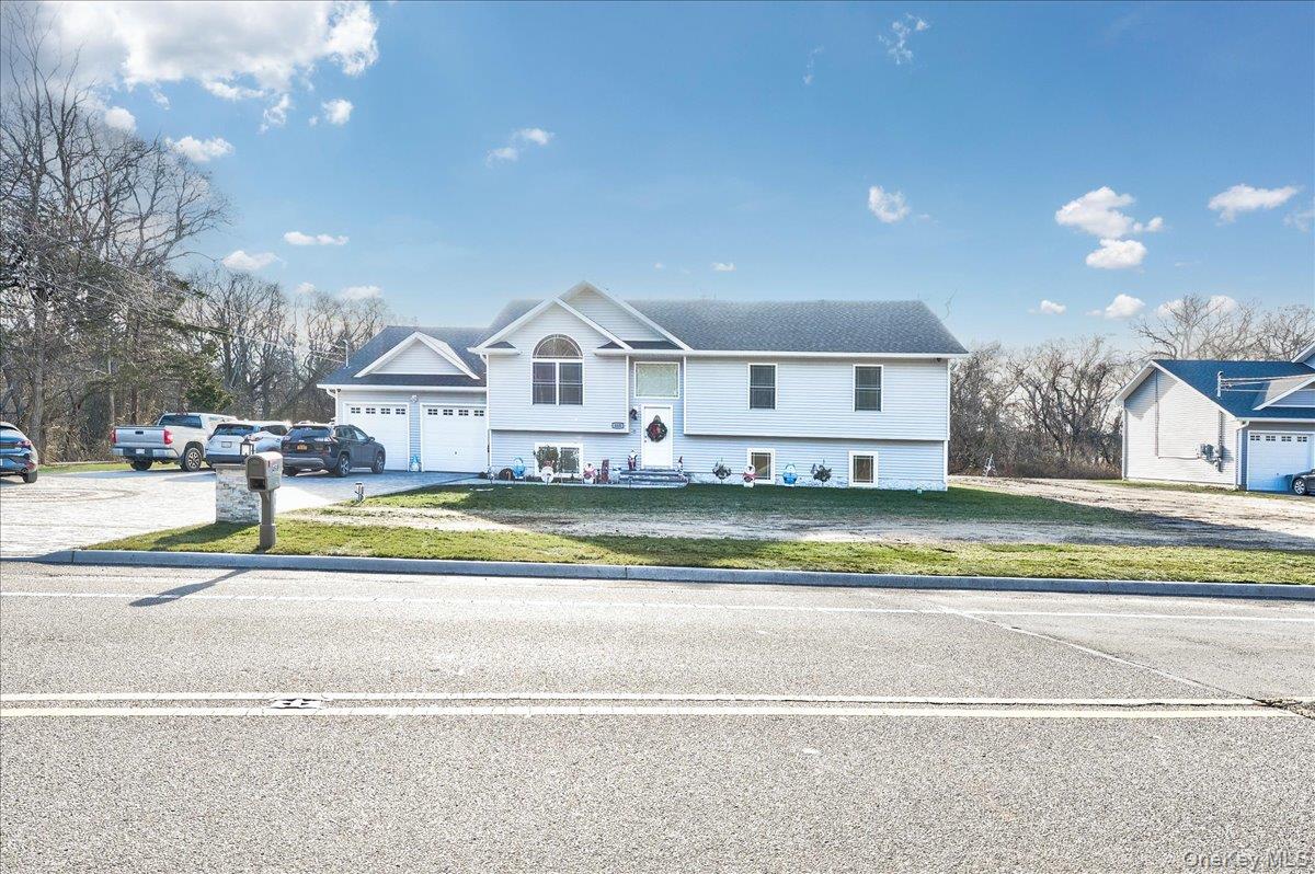468 Granny Road Medford, NY 11763 - Photo 3 of 42 a view of houses with yard and swimming pool