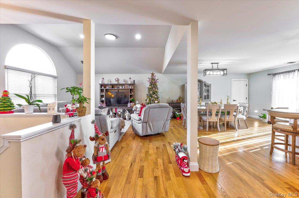 468 Granny Road Medford, NY 11763 - Photo 6 of 42 a living room with furniture and a wooden floor