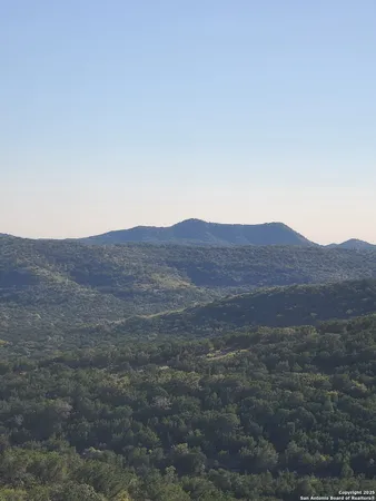 a view of a house with a mountain