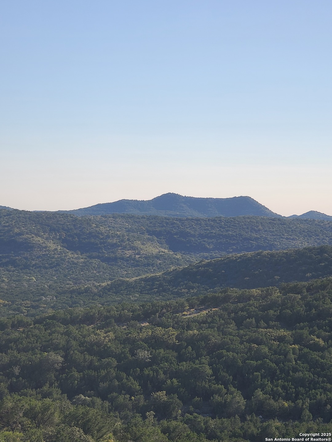 a view of a house with a mountain
