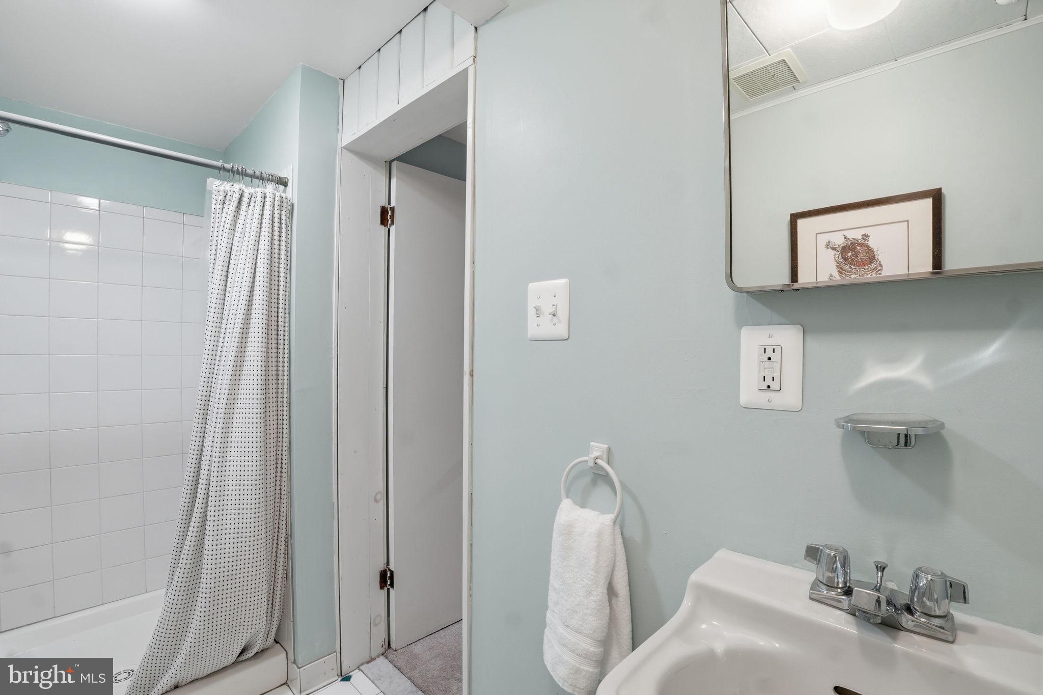 9601 Bruce Drive Silver Spring, MD 20901 - Photo 27 of 29 Serene bathroom with soft hues.