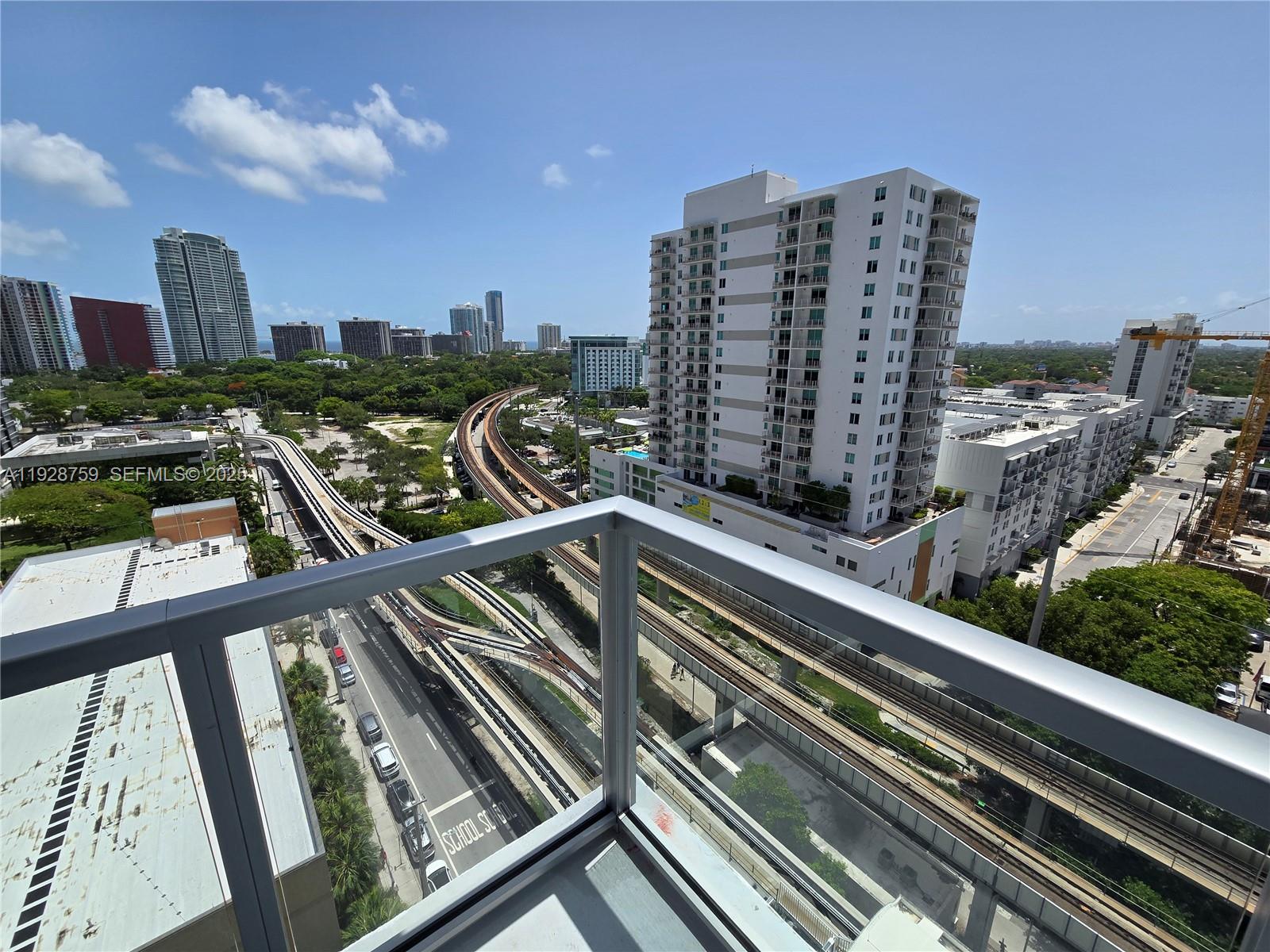 79 Southwest 12th Street, Unit 1701S Miami, FL 33130 - Photo 13 of 25 a view of swimming pool from a balcony