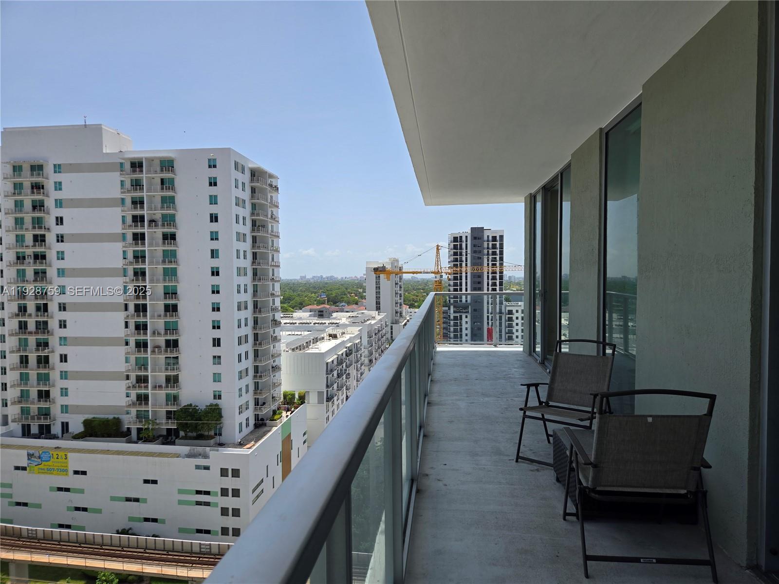 79 Southwest 12th Street, Unit 1701S Miami, FL 33130 - Photo 18 of 25 a view of balcony with furniture