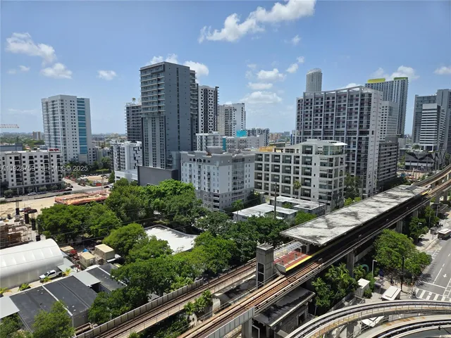 a city view with tall buildings
