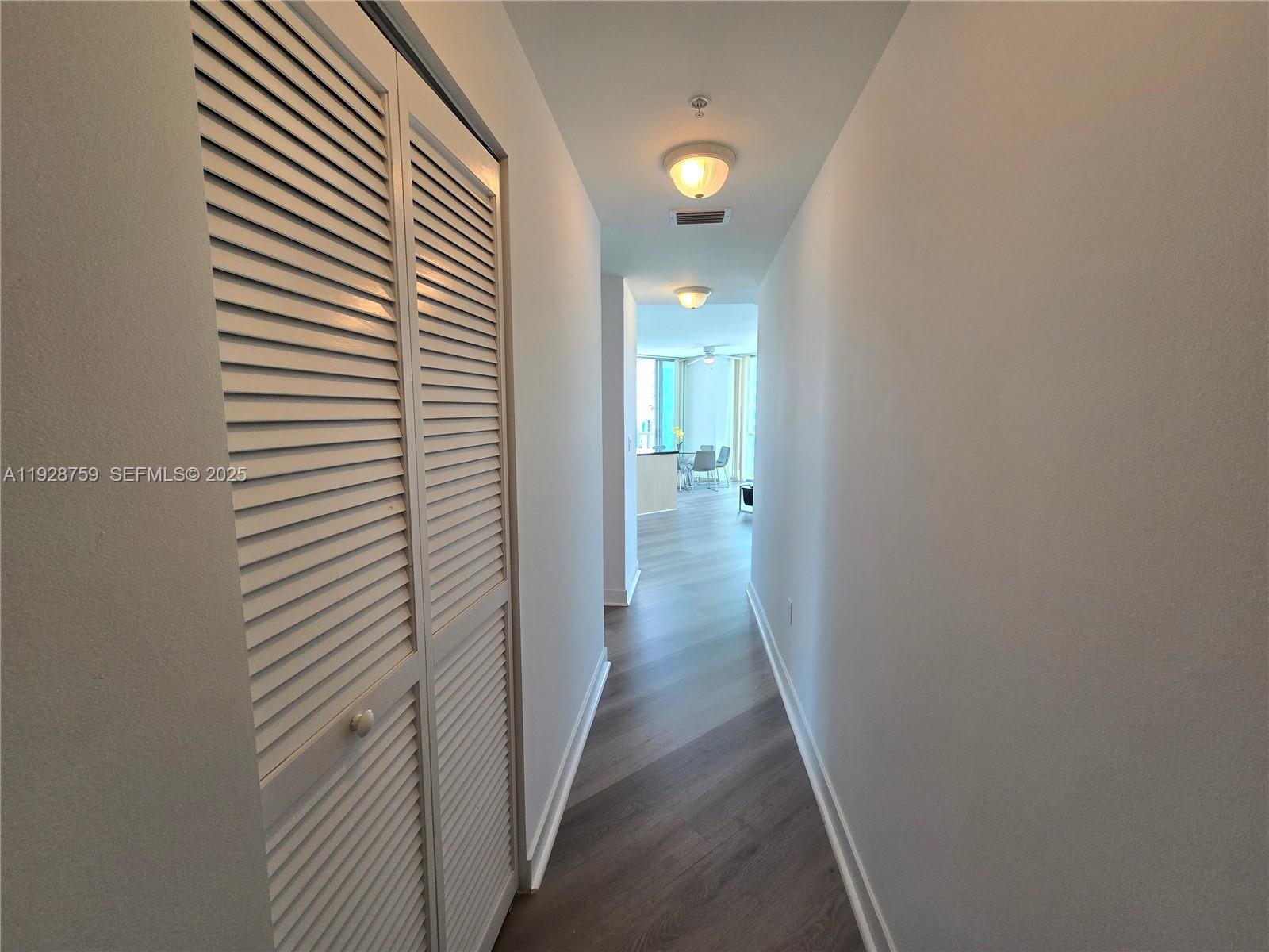 79 Southwest 12th Street, Unit 1701S Miami, FL 33130 - Photo 25 of 25 a view of a bathroom from a hallway