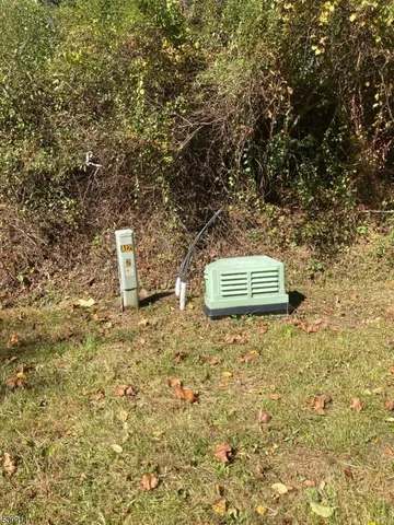 a building with trees in the background