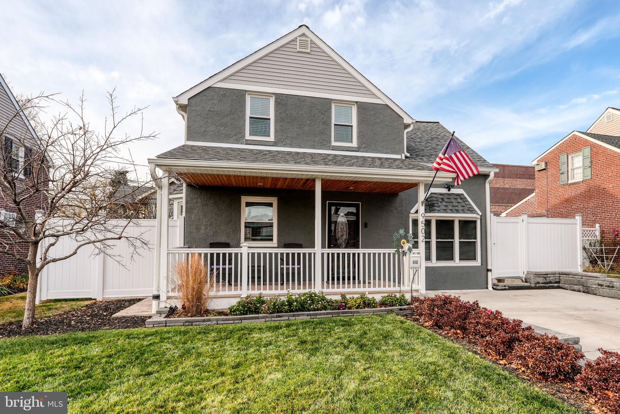 9502 Hilspach Street Philadelphia, PA 19115 - Photo 2 of 53 a front view of a house with a yard