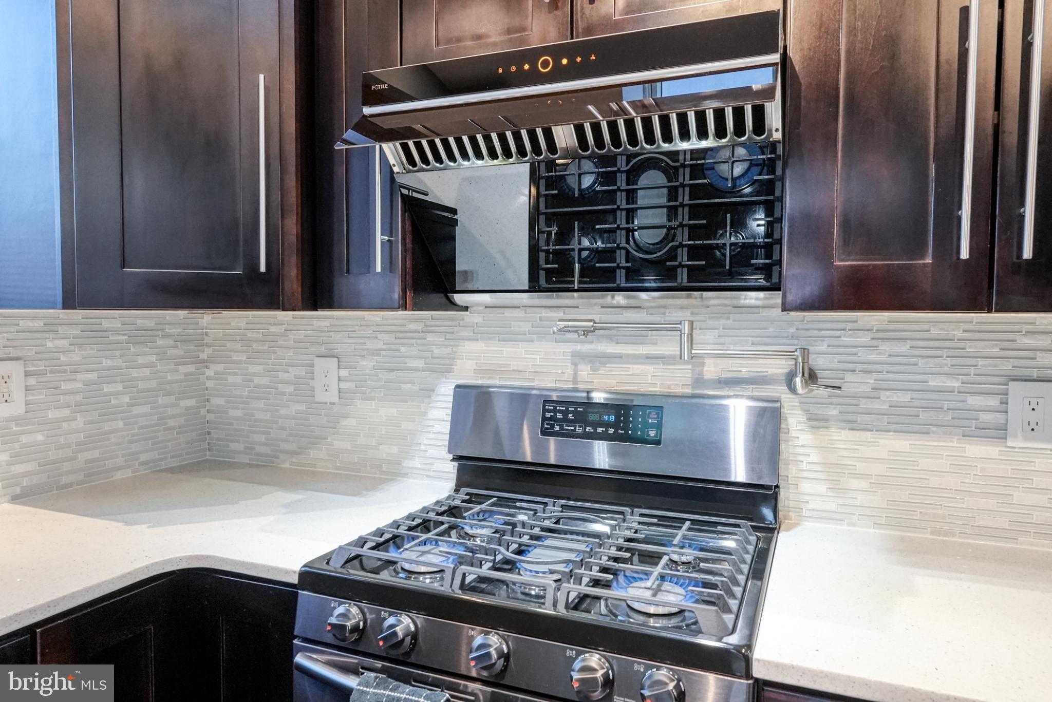 9502 Hilspach Street Philadelphia, PA 19115 - Photo 24 of 53 Sleek kitchen with modern appliances.