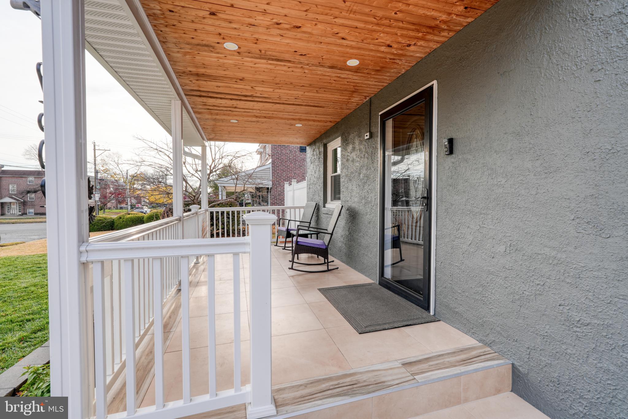 9502 Hilspach Street Philadelphia, PA 19115 - Photo 3 of 53 a view of a living room and a floor to ceiling window