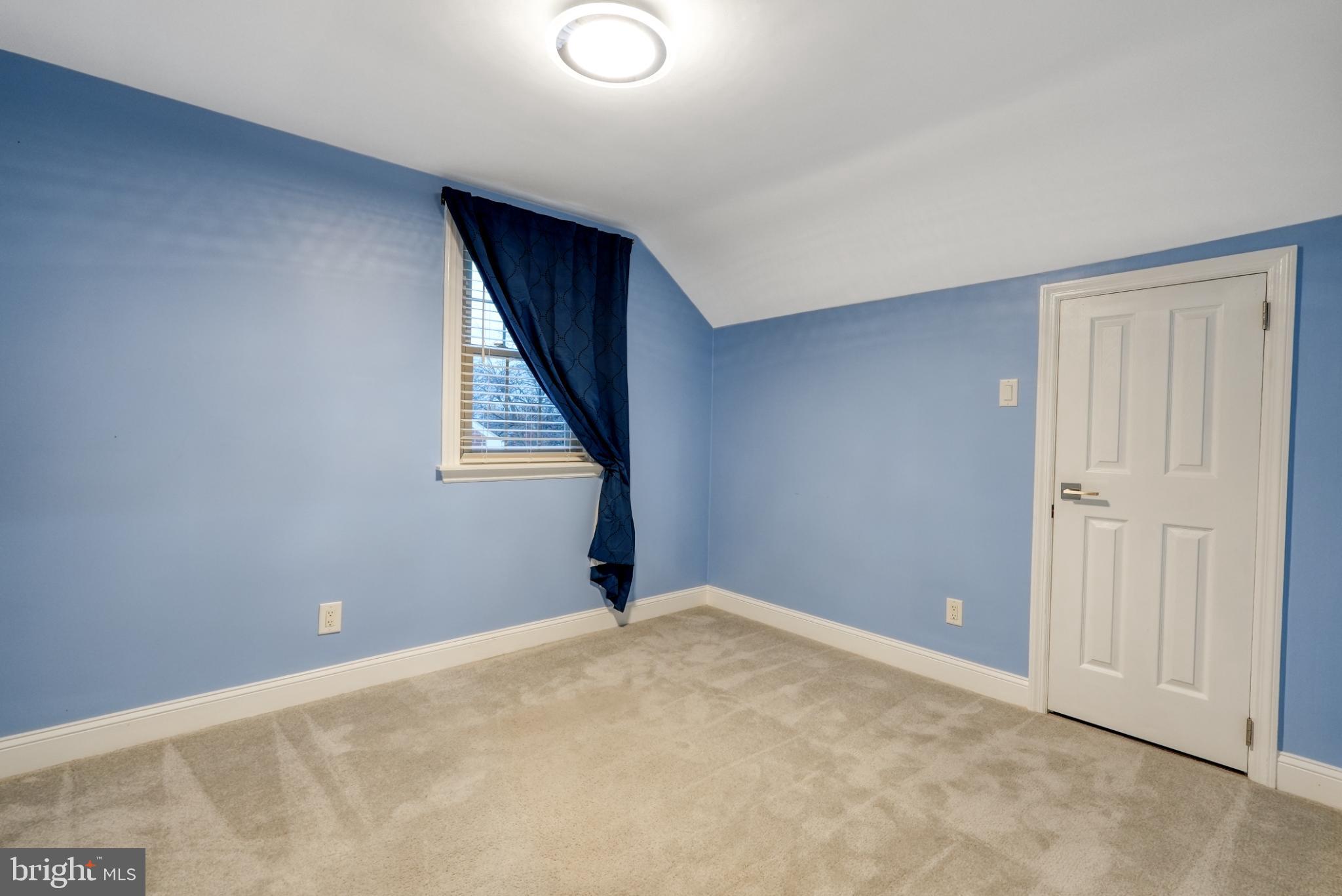 9502 Hilspach Street Philadelphia, PA 19115 - Photo 49 of 53 a view of an empty room with a window