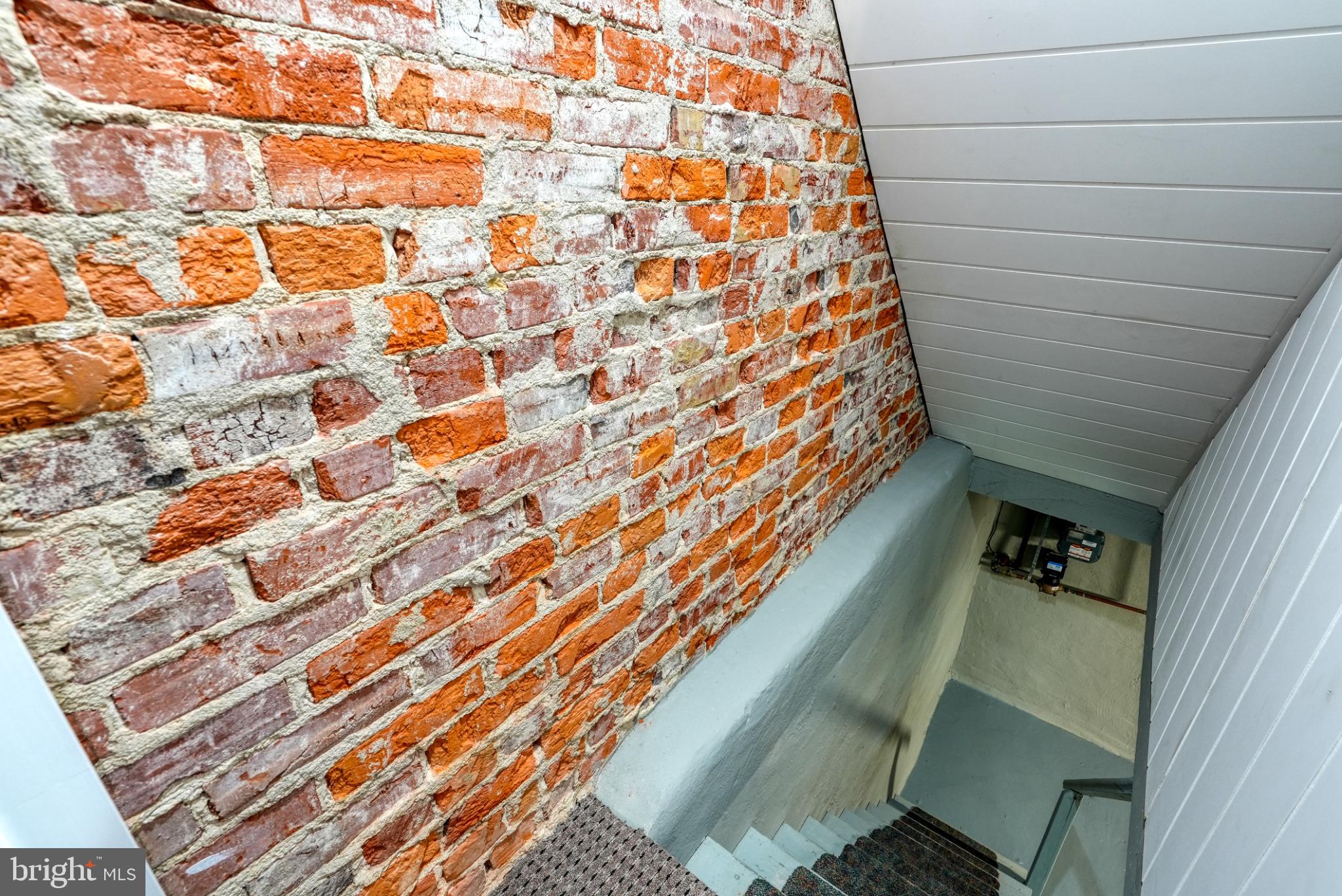 9502 Hilspach Street Philadelphia, PA 19115 - Photo 50 of 53 Charming brick staircase with modern flair.
