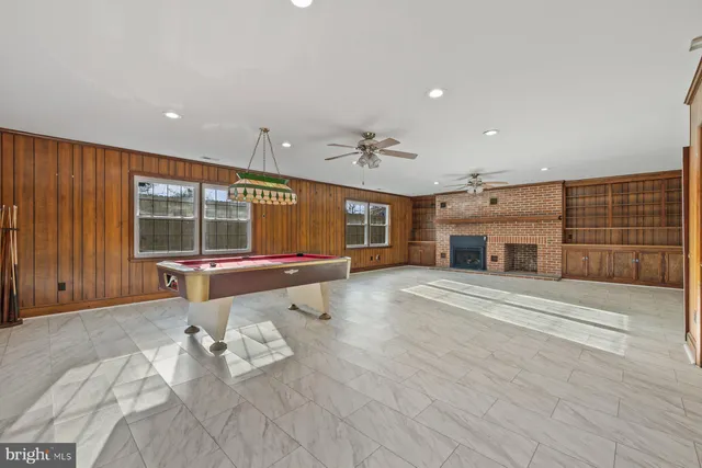 a view of livingroom with furniture and window