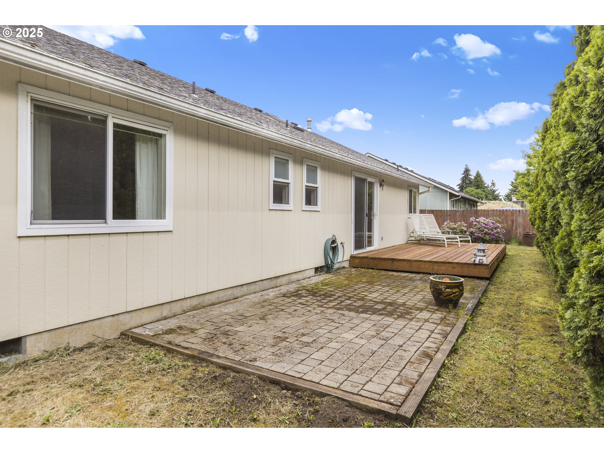 2335 Sony Loop Eugene, OR 97404 - Photo 26 of 30 a view of a livingroom with a fireplace and a workspace