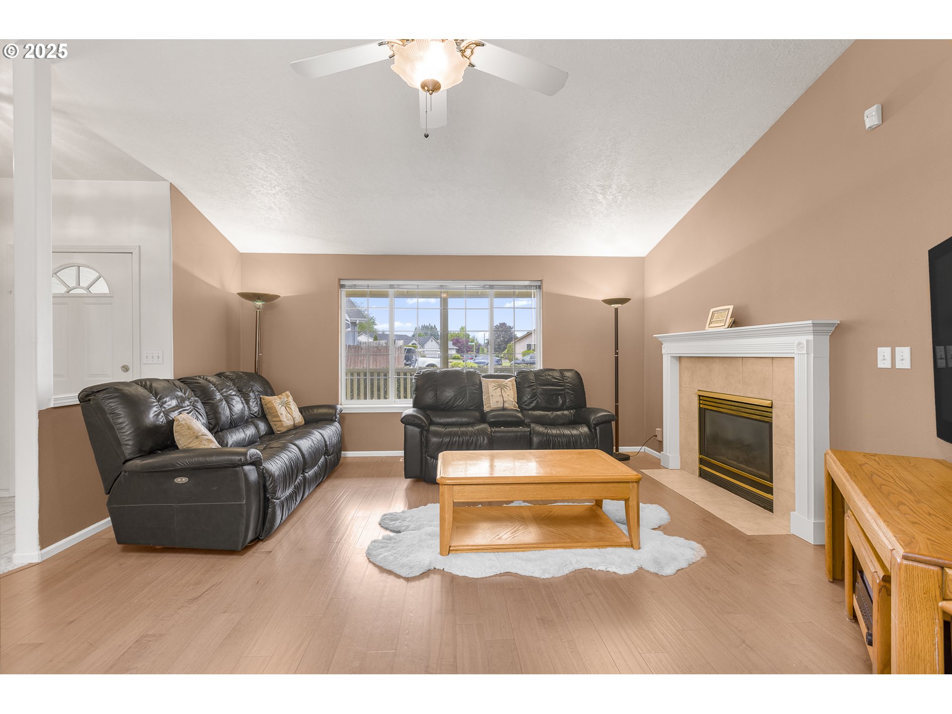 2335 Sony Loop Eugene, OR 97404 - Photo 4 of 30 a living room with furniture and a fireplace