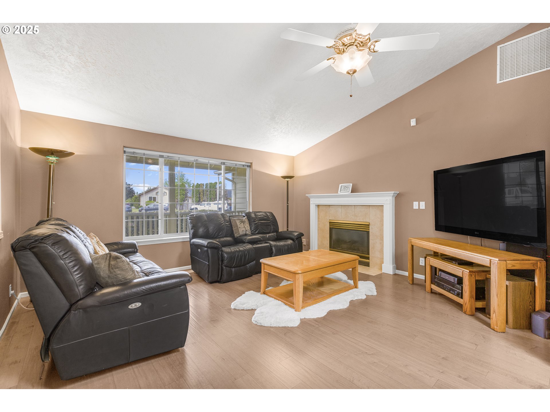 2335 Sony Loop Eugene, OR 97404 - Photo 5 of 30 a living room with furniture and a flat screen tv