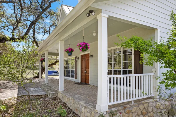 a front view of a house with a porch