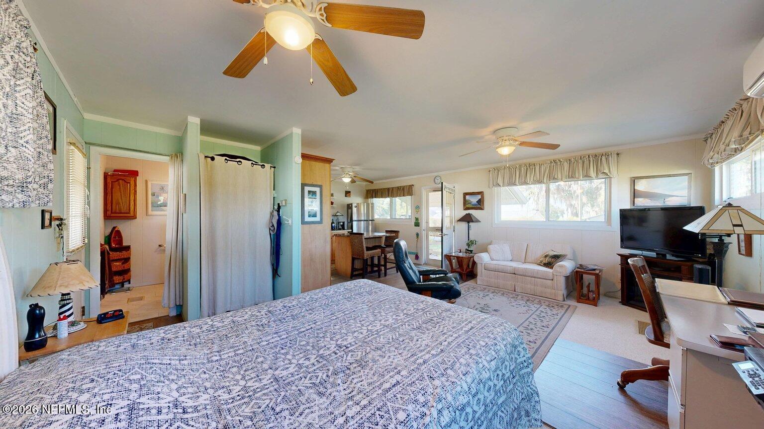 101 Possum Hollow Road Georgetown, FL 32139 - Photo 5 of 17 a bed room with a bed and dresser