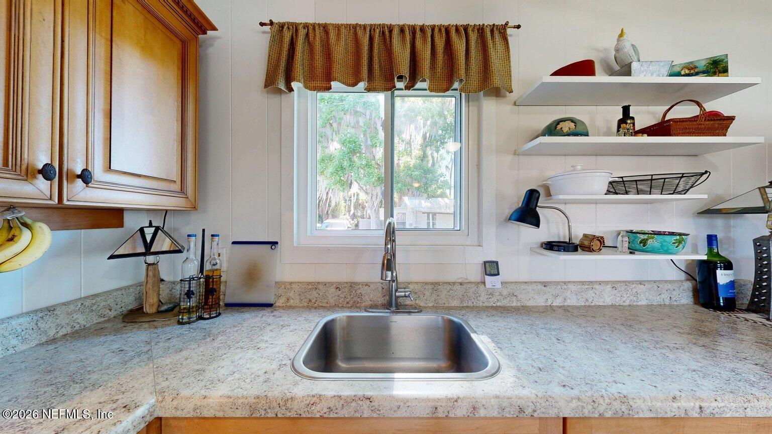 101 Possum Hollow Road Georgetown, FL 32139 - Photo 7 of 17 a kitchen with a sink and a window