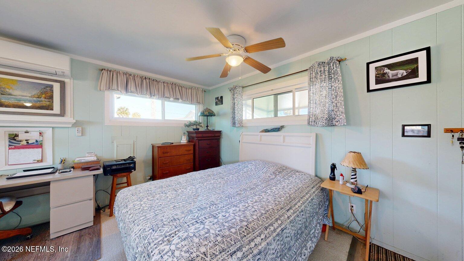101 Possum Hollow Road Georgetown, FL 32139 - Photo 8 of 17 a bedroom with a bed and a table in it