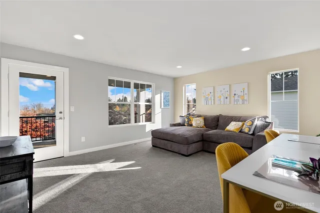 a living room with furniture and window