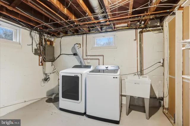 a view of outdoor space with deck and barbeque oven
