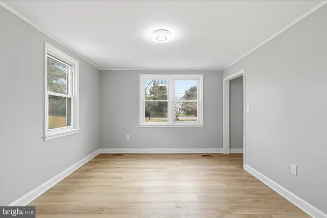 an empty room with windows