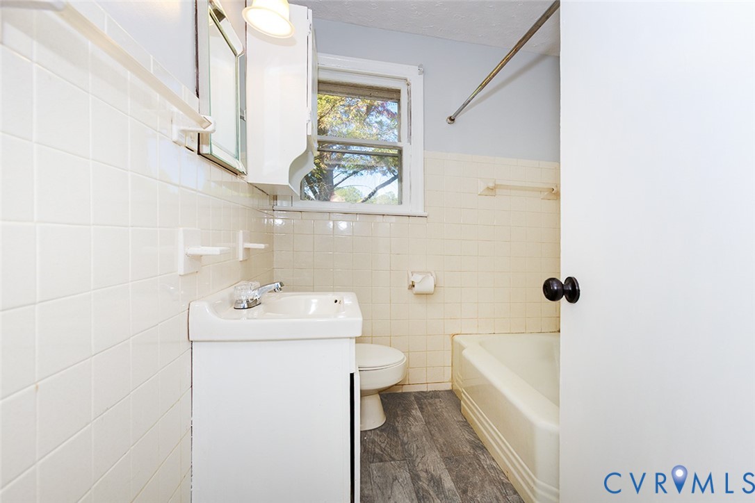 9903 Boze Road Ford, VA 23850 - Photo 22 of 45 a bathroom with a sink toilet and shower