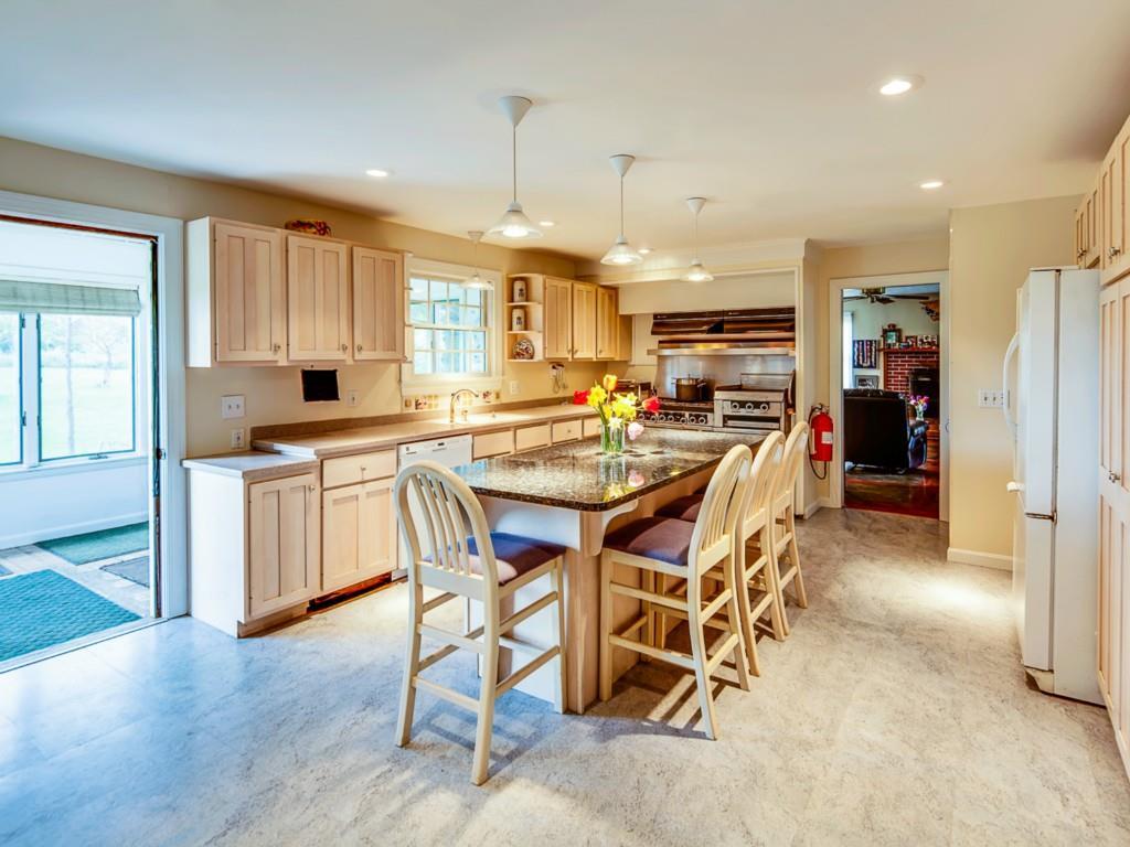404 Phillips Corner Road Pittsfield, ME 04967 - Photo 6 of 31 Kitchen. large island with...