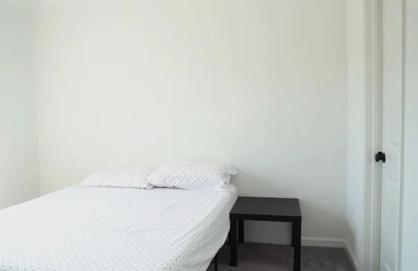 a close up of a white wall