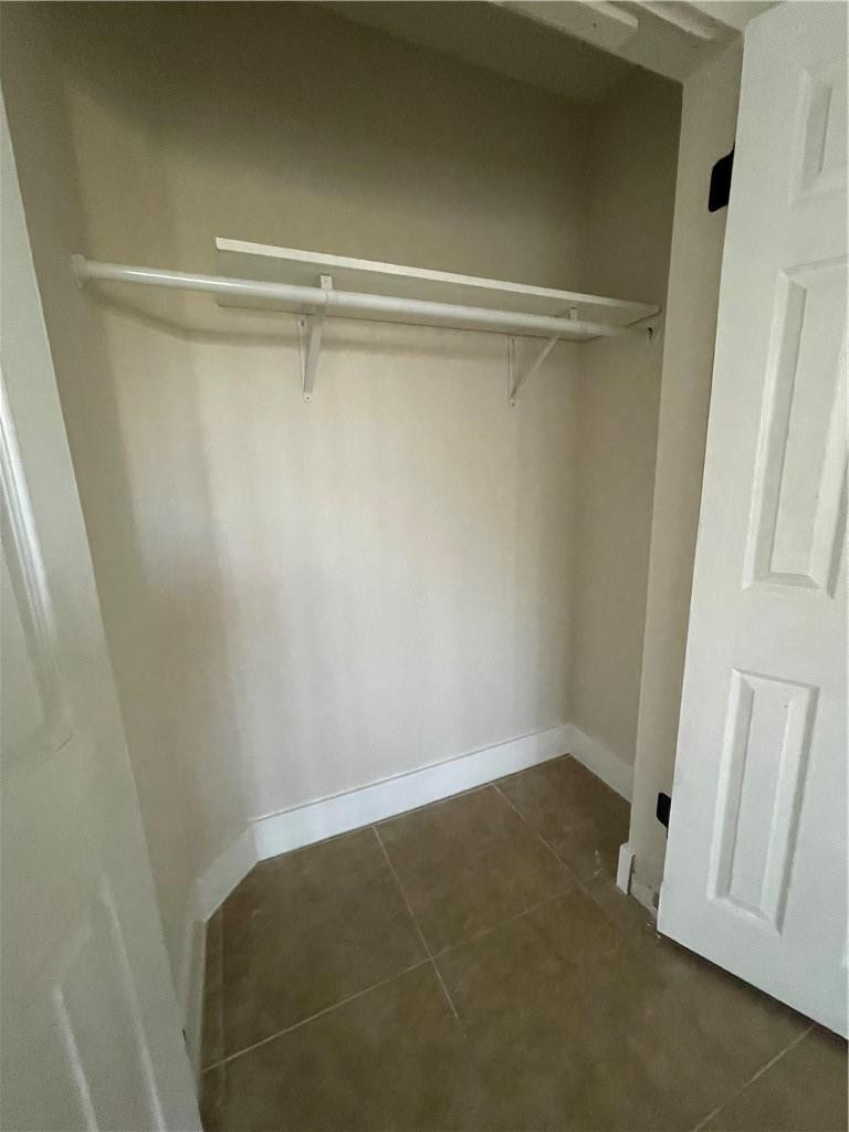8801 Wiles Road, Unit 108 Coral Springs, FL 33067 - Photo 11 of 22 a view of closet