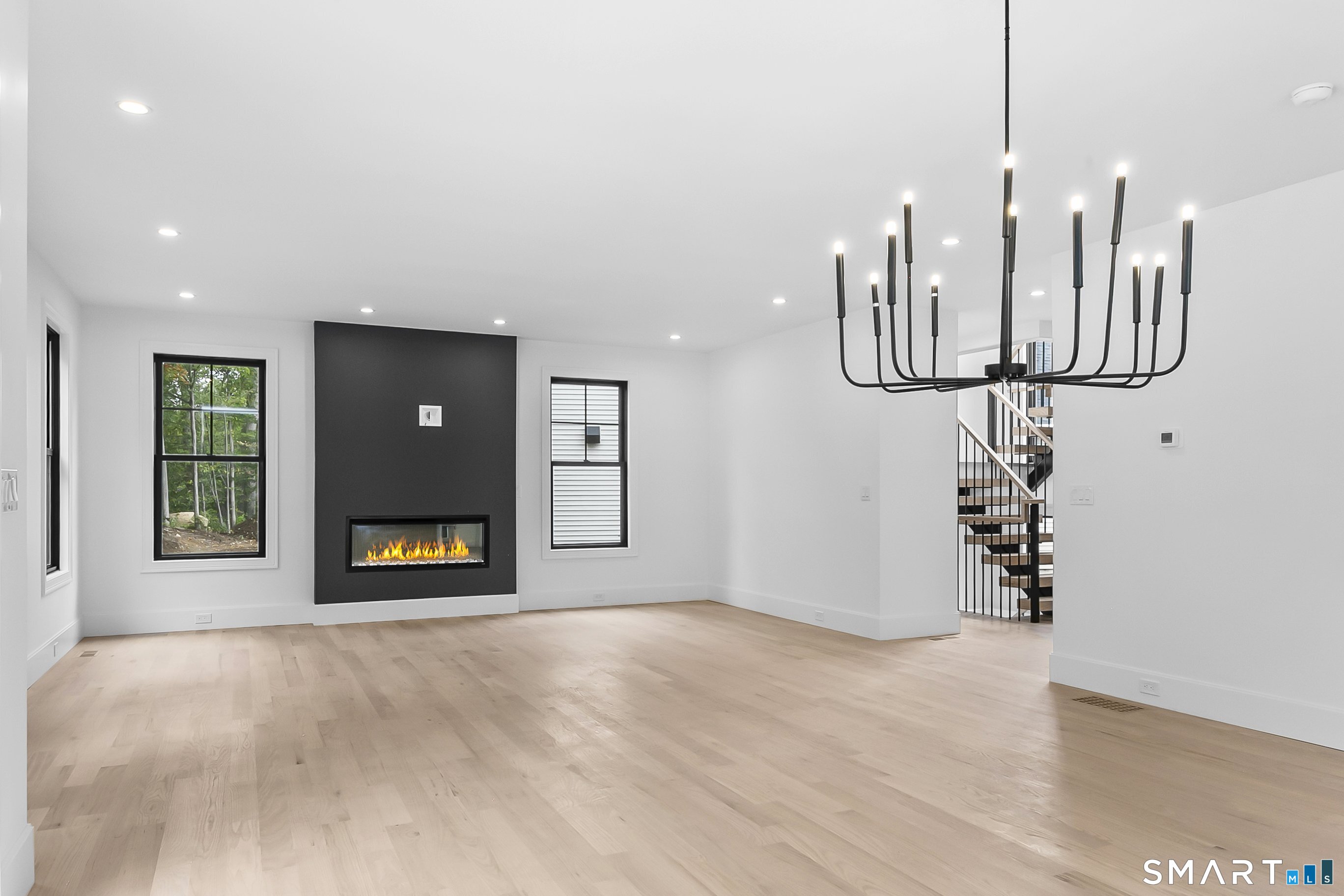80 Oronoque Hills Road Stratford, CT 06614 - Photo 14 of 31 a view interior of a house with entryway wooden floor and a fire place