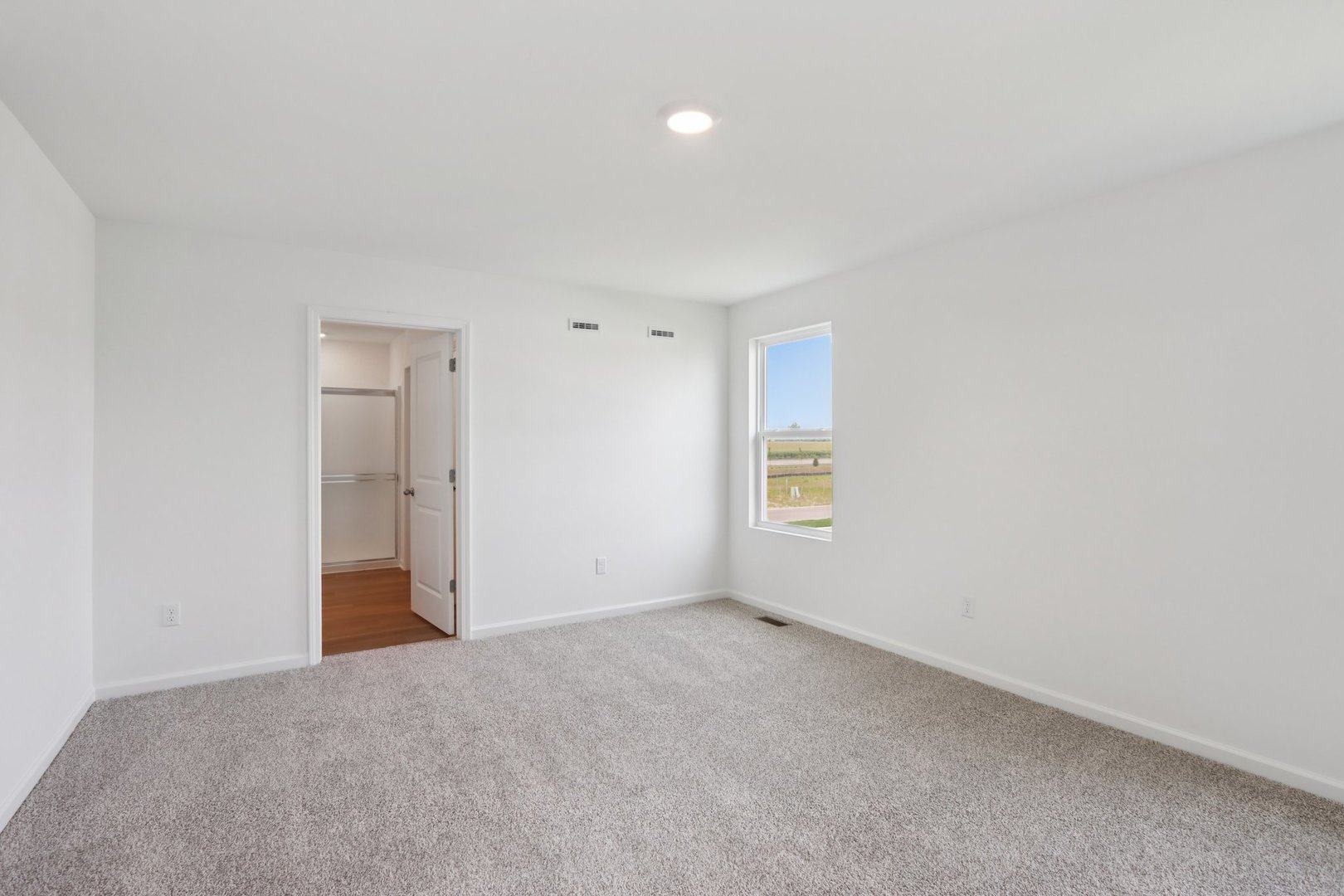 1812 Overland Drive Plainfield, IL 60586 - Photo 11 of 42 a view of an empty room with a window