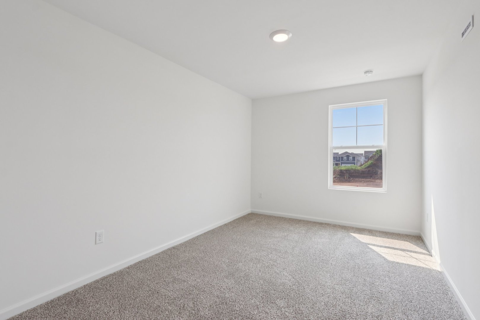 1812 Overland Drive Plainfield, IL 60586 - Photo 22 of 42 an empty room with a window