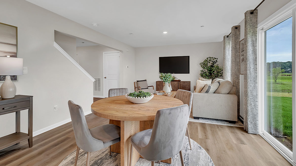 1812 Overland Drive Plainfield, IL 60586 - Photo 27 of 42 a view of a dining room with furniture and wooden floor
