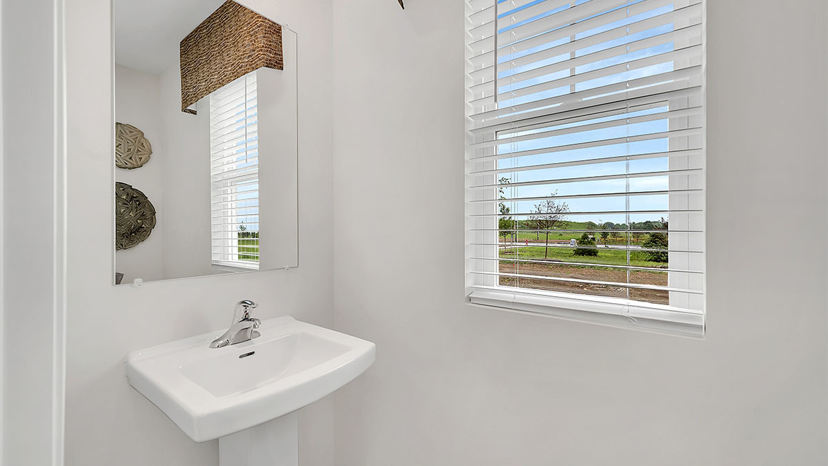 1812 Overland Drive Plainfield, IL 60586 - Photo 30 of 42 a bathroom with a sink and a mirror