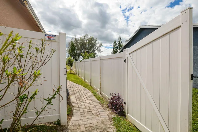 a house view with a backyard space