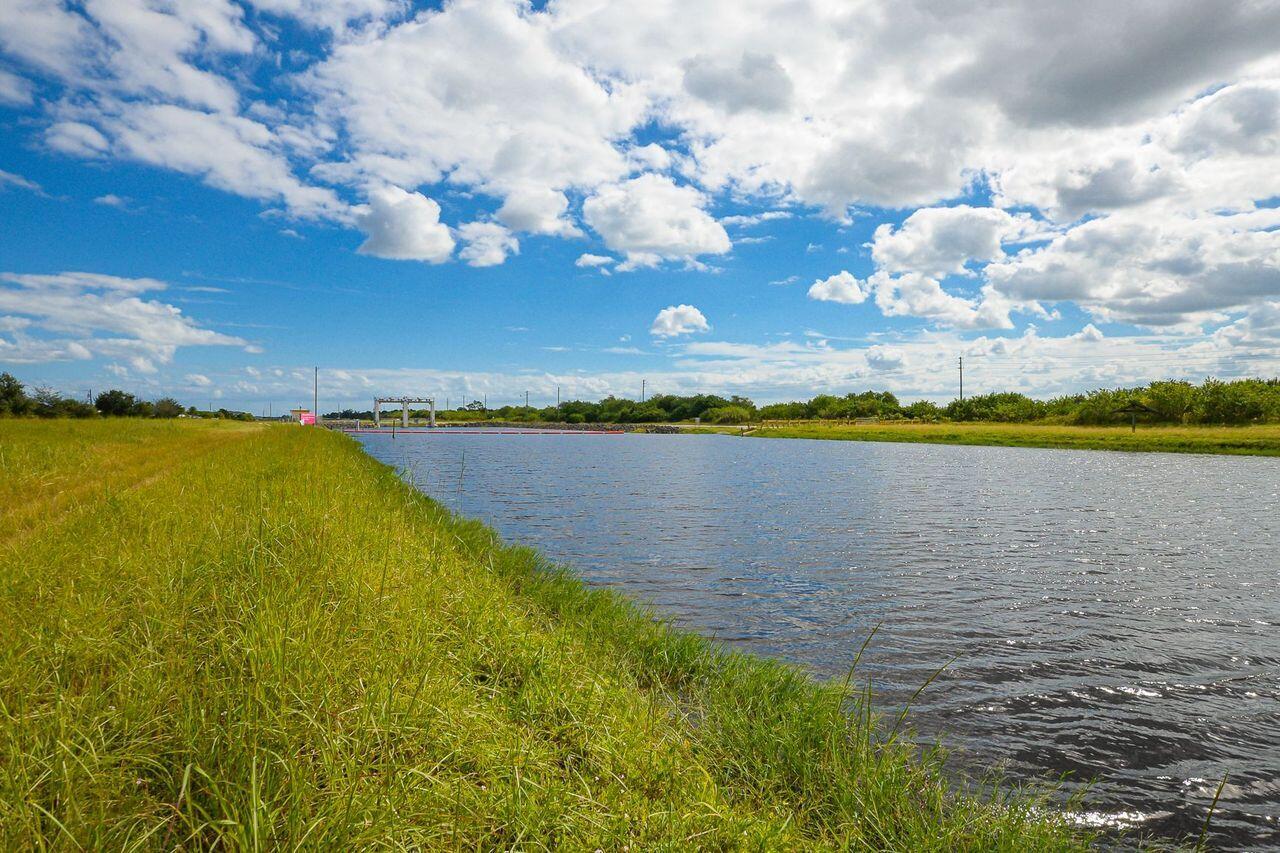341 Southwest Kestor Drive, Unit 341 Port St. Lucie, FL 34953 - Photo 17 of 19 a view of an ocean and beach