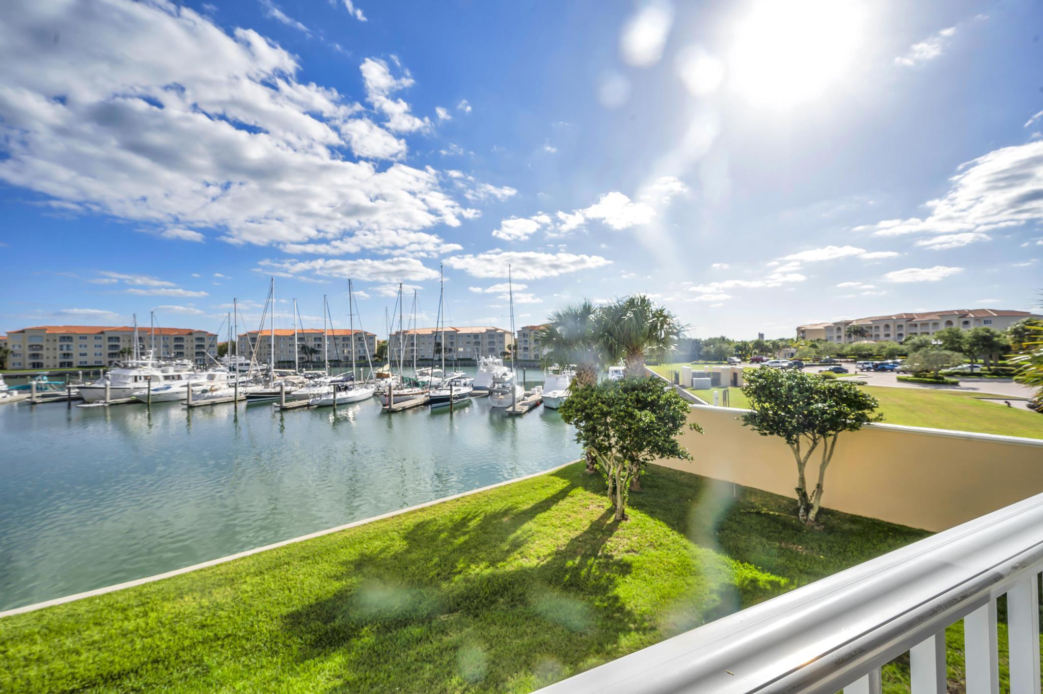 10 Harbour Isle Drive East, Unit 206 Fort Pierce, FL 34949 - Photo 12 of 12 a view of a lake with a city