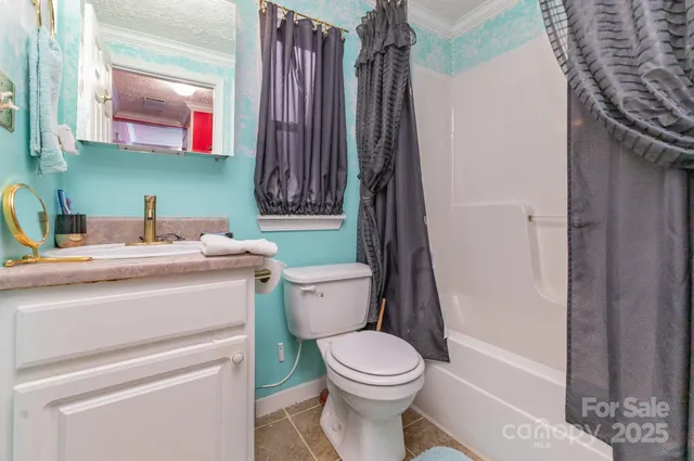 a living room with a flat screen tv and floor