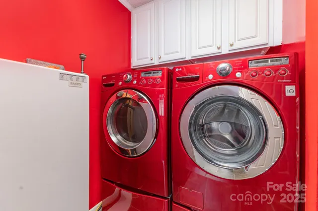 a view of an empty room with windows