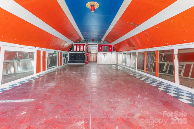 a view of outdoor space with trees in the background