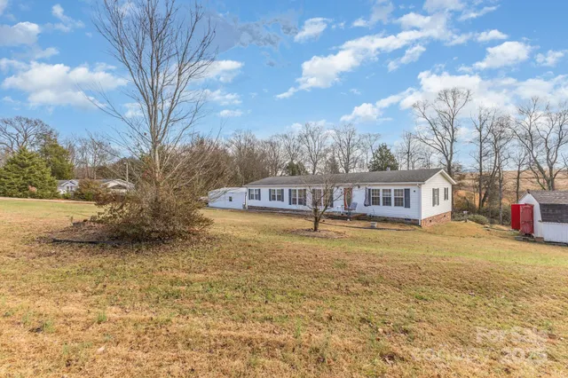 a view of a swimming pool with an ocean view
