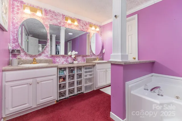 a hallway with pink walls