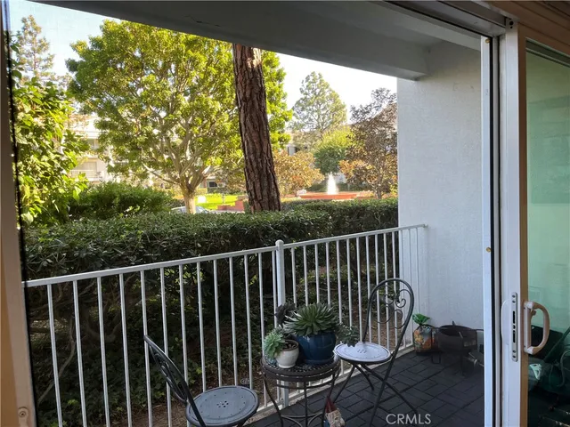 a bedroom with a bed and a mirror