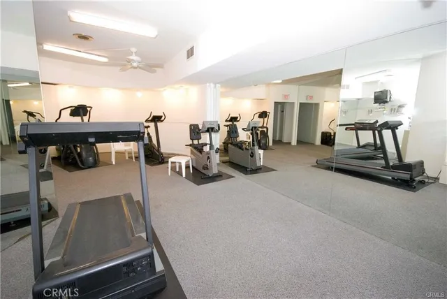 a view of a swimming pool with lounge chair
